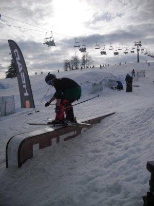 Ben Brand, Sunshine World Pro Team skiier demoing a disaster slide in the snowpark at Witow, Zakopane