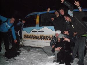 Team posing with Sunshine World Van